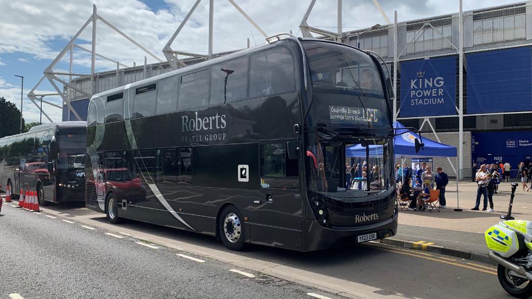 Roberts coach outside King Power Stadium